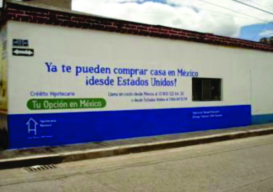 Barda con el anuncio Tu casa en México de Hipotecaria Nacional