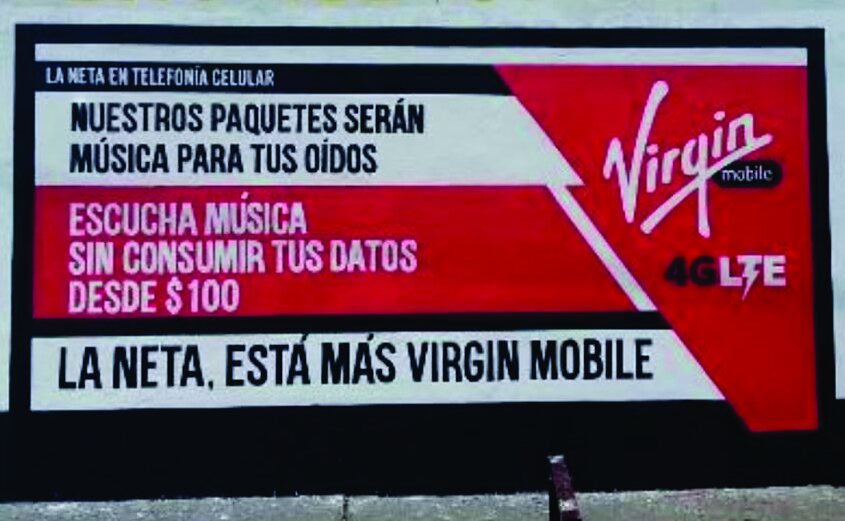 Barda roja de Virgin Mobile con el mensaje La neta, está más Virgin Mobile